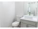Clean half bathroom with a modern sink and vanity at 19232 Stone Hedge Dr, Tampa, FL 33647