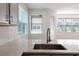 Kitchen with granite countertops, and an open concept that connects to the dining area at 19232 Stone Hedge Dr, Tampa, FL 33647