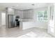 Modern kitchen features stainless steel appliances and a breakfast bar at 19232 Stone Hedge Dr, Tampa, FL 33647