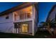 Condo exterior featuring a balcony above the garage space at 19717 Gulf Blvd # V5, Indian Shores, FL 33785