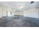 Spacious two car garage with concrete floors and white walls at 19717 Gulf Blvd # V5, Indian Shores, FL 33785