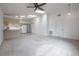 Bright living room featuring vaulted ceilings with skylights and a ceiling fan at 208 Oakwood Blvd, Oldsmar, FL 34677