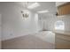 Large living space featuring vaulted ceilings with skylights and a ceiling fan at 208 Oakwood Blvd, Oldsmar, FL 34677