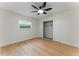 Bedroom with new flooring and a spacious closet at 2272 Adam Ct, Palm Harbor, FL 34683