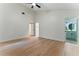 Bedroom with new flooring and ensuite bath featuring modern fixtures at 2272 Adam Ct, Palm Harbor, FL 34683