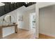 Hallway featuring modern decor and access to a modern bathroom at 2272 Adam Ct, Palm Harbor, FL 34683