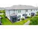 Backyard view featuring screened in patios perfect for relaxing and entertaining outdoors at 2435 Foggy Creek Cir, Clearwater, FL 33764