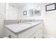 Bathroom featuring double sinks and white cabinets at 2435 Foggy Creek Cir, Clearwater, FL 33764