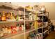 Well-organized pantry with wire shelving and ample storage space for food items at 2435 Foggy Creek Cir, Clearwater, FL 33764