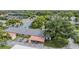 High aerial view highlighting community layout, with mature trees and covered parking spots at 2465 Northside Dr # 605, Clearwater, FL 33761