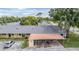 Aerial view showing convenient covered parking and well-maintained landscaping within the community at 2465 Northside Dr # 605, Clearwater, FL 33761