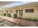 Charming exterior showcasing well-maintained landscaping and a welcoming entrance to the home at 2465 Northside Dr # 605, Clearwater, FL 33761