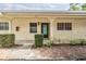 Charming condo with stucco exterior, landscaped front, and clearly marked address at 2465 Northside Dr # 605, Clearwater, FL 33761