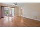 Spacious living room featuring laminate flooring and access to the patio at 2465 Northside Dr # 605, Clearwater, FL 33761
