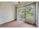 Cozy sunroom with large windows offering serene backyard views at 2465 Northside Dr # 605, Clearwater, FL 33761
