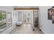 Attic showcasing a built in ladder access and natural light at 2820 Whitney Rd, Clearwater, FL 33760