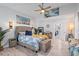 Large main bedroom with a vaulted ceiling with stylish decor and ample natural light at 2820 Whitney Rd, Clearwater, FL 33760