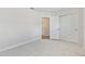 Bedroom featuring a closet, plush carpeting, and ample space for storage at 2885 Deer Pine Trl, Land O Lakes, FL 34638