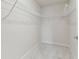 Walk-in closet featuring white wire shelving and carpet at 2885 Deer Pine Trl, Land O Lakes, FL 34638