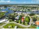 Aerial view of a waterfront neighborhood with canals and private boat docks for easy water access at 301 Carlyle Blvd, Ruskin, FL 33570