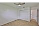 Clean bedroom features wood-look flooring and a closet at 301 Carlyle Blvd, Ruskin, FL 33570