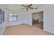Living area featuring dining nook, vinyl floors and natural light at 301 Carlyle Blvd, Ruskin, FL 33570