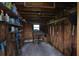 Functional storage room with wooden walls and shelves, perfect for tools and equipment at 301 Carlyle Blvd, Ruskin, FL 33570