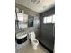 Updated bathroom features a sleek vessel sink, modern fixtures, and a walk-in shower at 3014 58Th S St, Gulfport, FL 33707