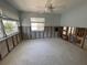 Spacious bedroom featuring large windows, a ceiling fan, and the opportunity to create your dream space at 3014 58Th S St, Gulfport, FL 33707