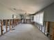 Renovation project: Open-concept room with exposed studs, awaiting drywall installation and finishing touches at 3014 58Th S St, Gulfport, FL 33707