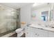 Modern bathroom featuring a glass-enclosed shower, sleek vanity, and updated fixtures at 3018 59Th S St # 405, Gulfport, FL 33707