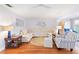Cozy living room with hardwood floors, a plush sectional, and stylish decor at 3018 59Th S St # 405, Gulfport, FL 33707