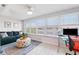 Inviting sunroom with comfortable seating, large windows, and plenty of natural light at 3018 59Th S St # 405, Gulfport, FL 33707