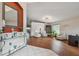 Beautifully designed living room with hardwood floors, neutral walls, and stylish decor at 31244 Baclan Dr, Wesley Chapel, FL 33545
