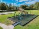 Outdoor fitness and playground features offer fun activities in this community park at 31244 Baclan Dr, Wesley Chapel, FL 33545