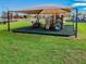 Playground with colorful play equipment and soft landing, perfect for fun at 31244 Baclan Dr, Wesley Chapel, FL 33545