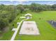 Sand volleyball court in a community park, great for friendly games and outdoor activities at 31244 Baclan Dr, Wesley Chapel, FL 33545