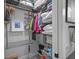 Organized walk-in closet with metal shelving, ample storage space, and a variety of clothing and accessories at 325 5Th S Ave # 9, St Petersburg, FL 33701