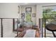 Upstairs hallway with hardwood floors and natural light coming from large windows at 325 5Th S Ave # 9, St Petersburg, FL 33701