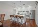 Modern kitchen with white cabinetry, stainless steel appliances, and a center island with seating at 325 5Th S Ave # 9, St Petersburg, FL 33701
