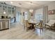 Charming dining area with a chandelier and a round table near a window at 33668 Willow Point Ct, Wesley Chapel, FL 33545