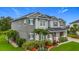 Exterior showcasing an attractive home with well-maintained landscaping, enhancing its curb appeal at 33668 Willow Point Ct, Wesley Chapel, FL 33545