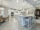 Island kitchen with granite countertops, pendant lighting, and stainless steel appliances at 33668 Willow Point Ct, Wesley Chapel, FL 33545