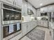 Well-equipped kitchen with stainless appliances and custom cabinets for ample storage at 33668 Willow Point Ct, Wesley Chapel, FL 33545
