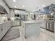 Modern kitchen with stainless appliances, a center island, and lots of cabinet space at 33668 Willow Point Ct, Wesley Chapel, FL 33545
