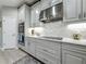 Updated kitchen with granite countertops, stainless steel appliances, and tile backsplash at 33668 Willow Point Ct, Wesley Chapel, FL 33545
