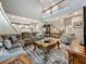 Spacious living room with high ceilings and detailed trim plus a gray sofa for relaxing at 33668 Willow Point Ct, Wesley Chapel, FL 33545
