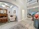 Open-concept living room features hardwood floors, a fireplace, and seamless integration with the home's design at 33668 Willow Point Ct, Wesley Chapel, FL 33545