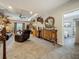 Relaxing living room featuring comfortable seating, elegant décor, and natural light at 33668 Willow Point Ct, Wesley Chapel, FL 33545