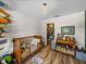 Bright ' bedroom with wood floors, closet and storage at 3412 Ace Ln, Dover, FL 33527